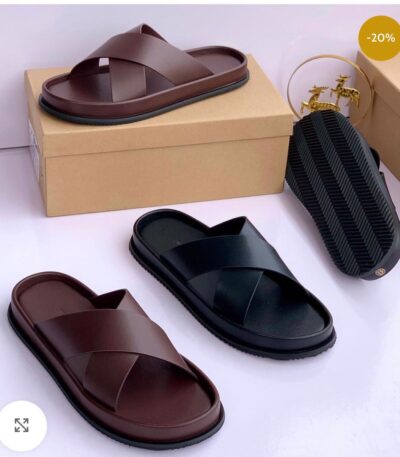 High-quality leather slide sandals for men in black and brown, featuring a double strap design and contoured footbed for ultimate comfort and style.