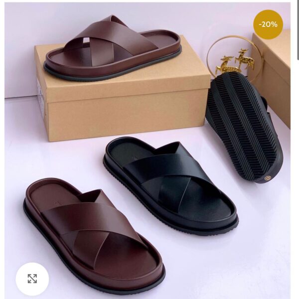 High-quality leather slide sandals for men in black and brown, featuring a double strap design and contoured footbed for ultimate comfort and style.