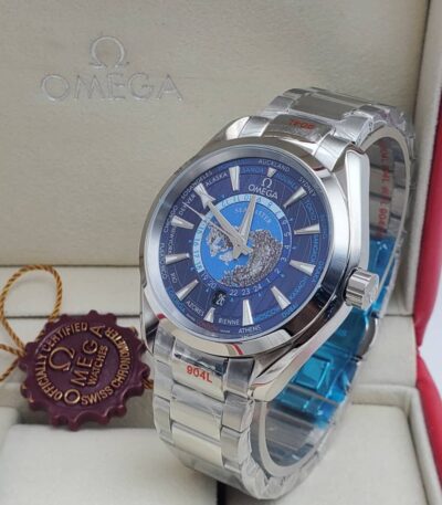 A luxurious Omega World Time watch with a blue dial and stainless steel band, presented in an elegant box with a red interior and a certificate of authenticity.