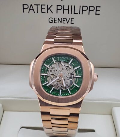 A rose gold Patek Philippe Geneve watch with a green dial, showcasing its intricate mechanical details, presented in a luxurious setting.