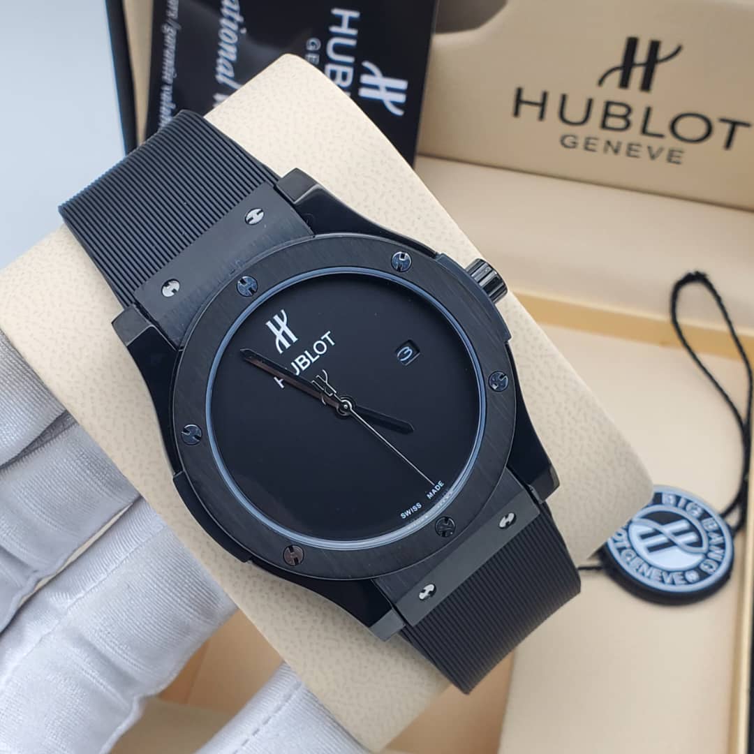 IMG-20260612-WA0015 A close-up shot of a Hublot Big Bang watch with a black ceramic case and band, showcasing its sleek design and Swiss made movement.