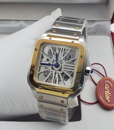 A luxurious Cartier watch with a skeleton face, gold and silver tones, and a leather tag, exuding high-end sophistication.