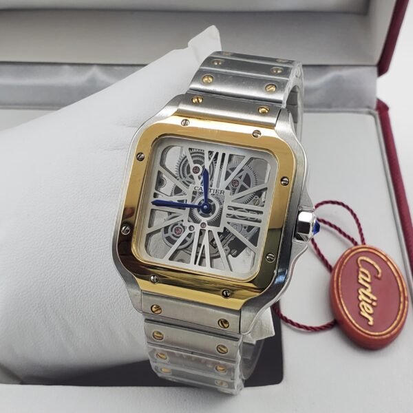 A luxurious Cartier watch with a skeleton face, gold and silver tones, and a leather tag, exuding high-end sophistication.